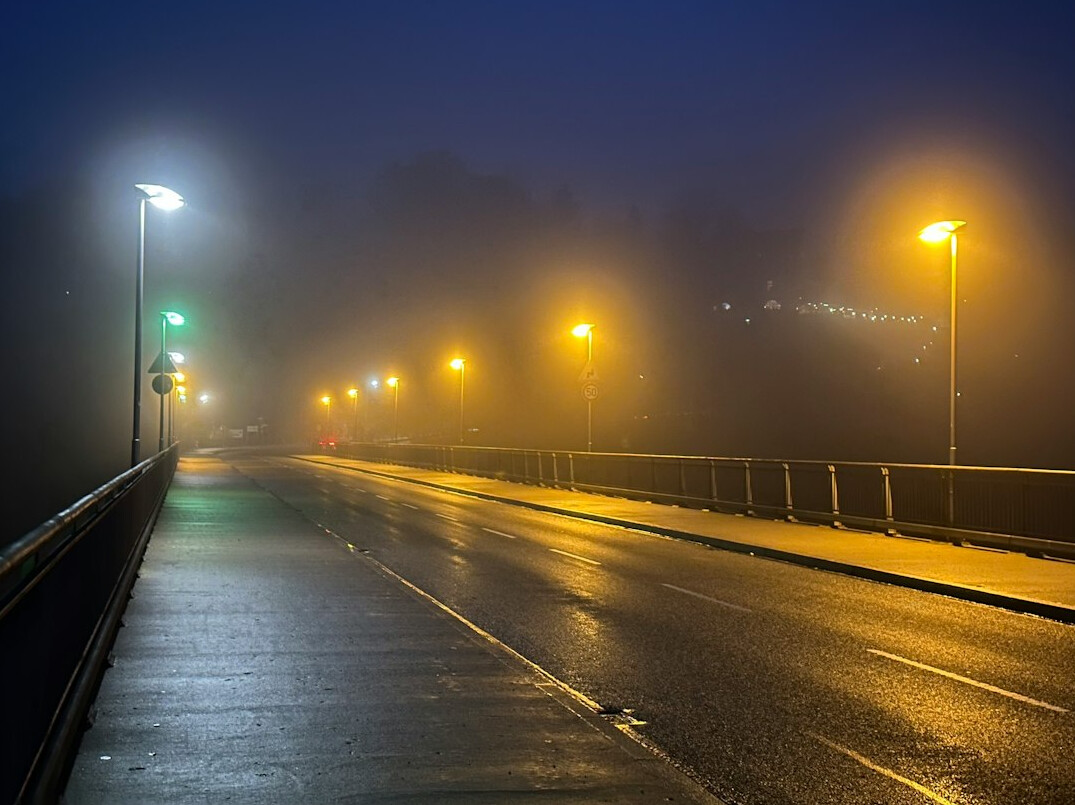 mysterious foggy street at night