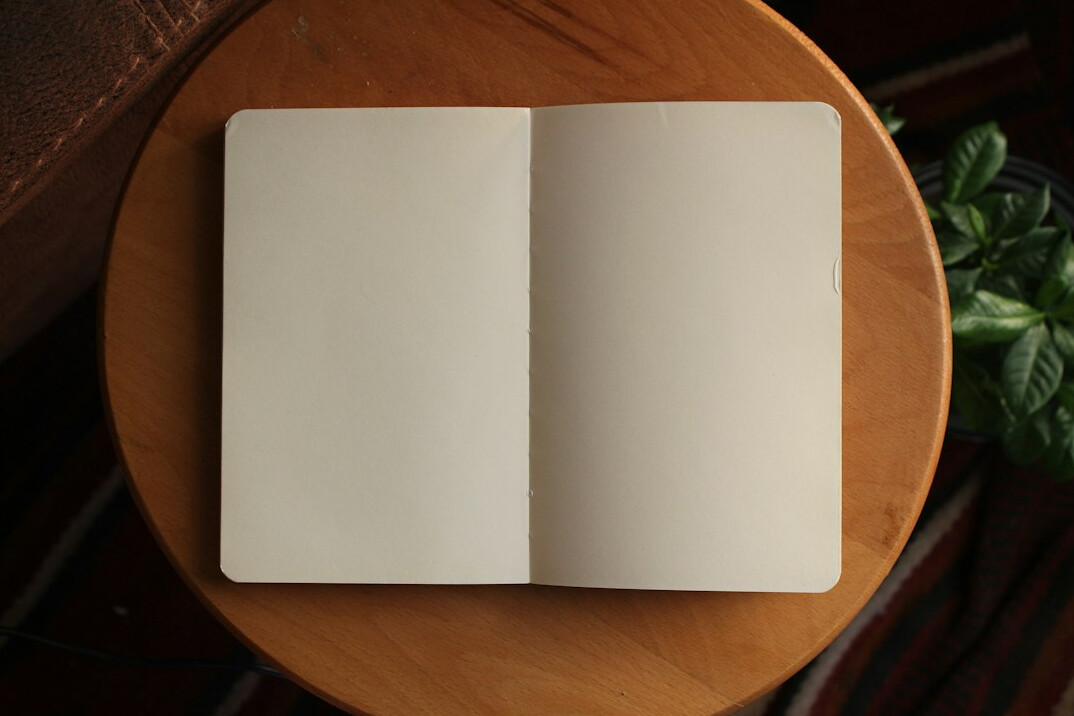 open mystery book on table