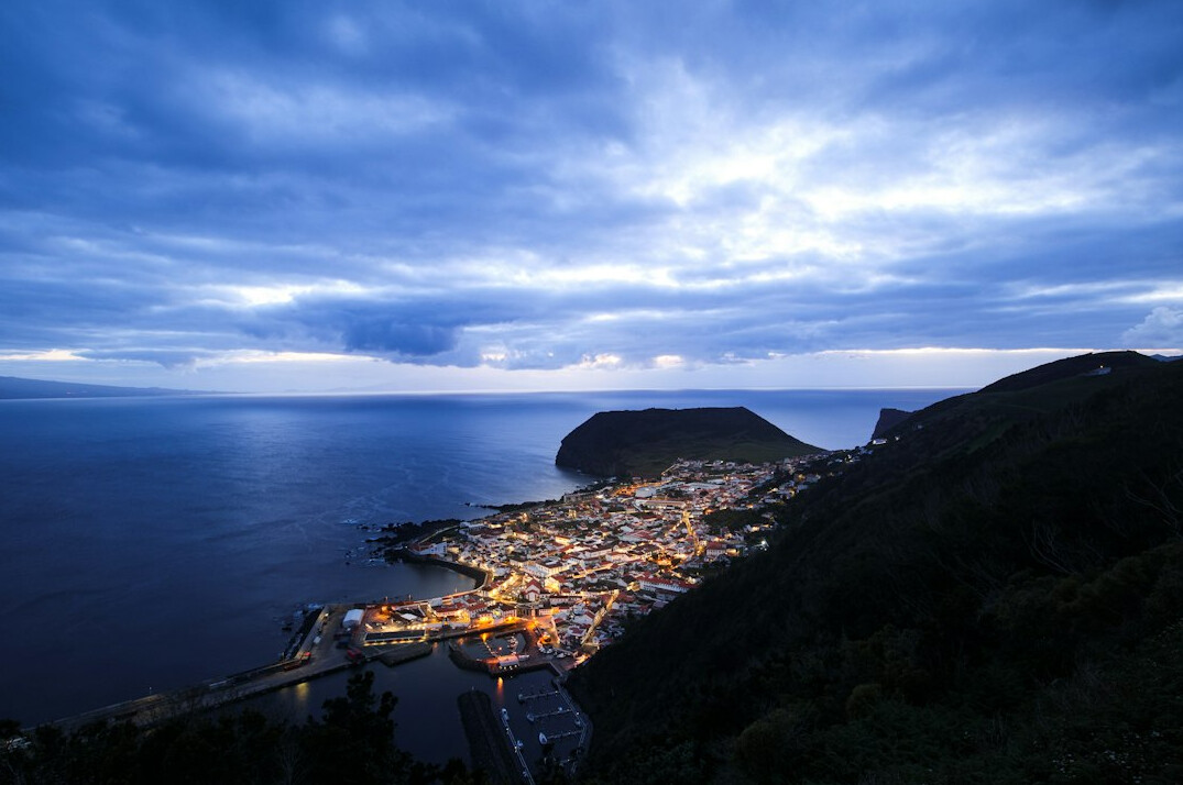 foggy coastal town at night